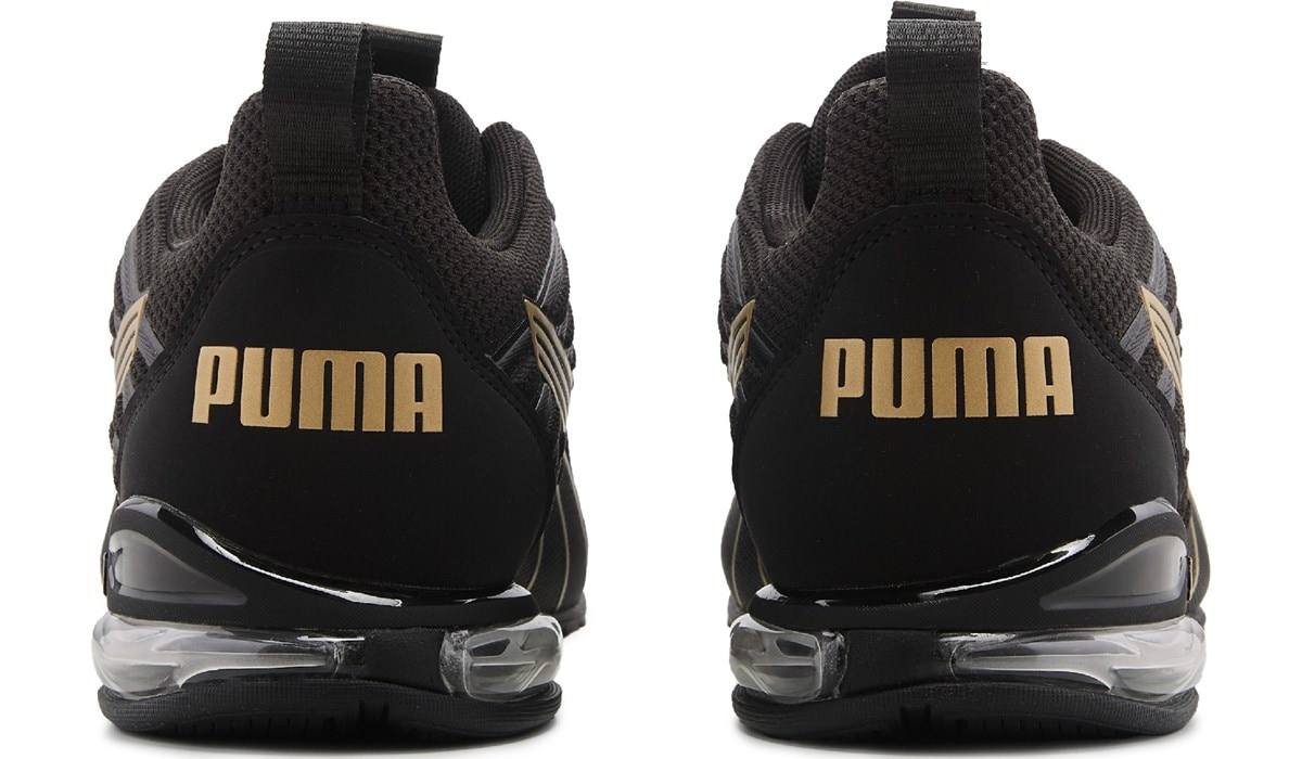 Puma black and gold running shoes on sale