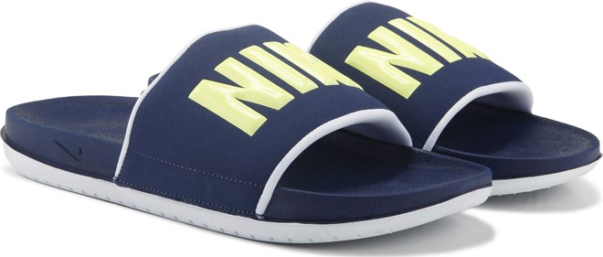 blue and yellow nike slides