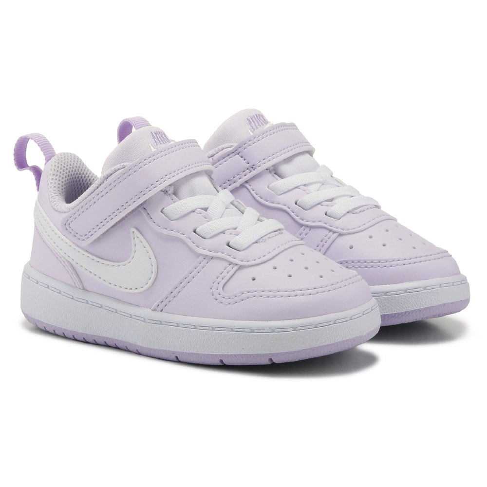 Purple nikes kids on sale