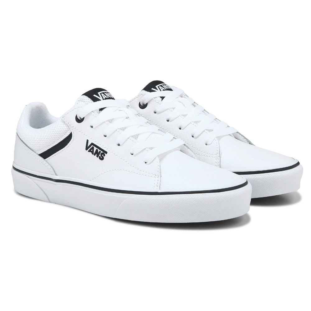 White shops vans slip ons famous footwear